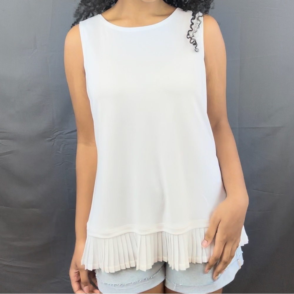 White/sheer ruffled tank top from Chico’s.